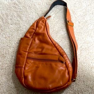 Brown leather sling back purse